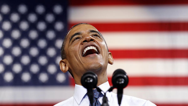 Obama, Romney exchange barbs as jobs number improves