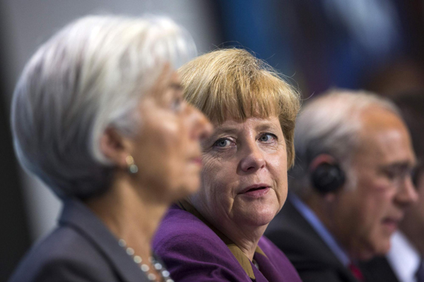 Merkel, economic leaders call for fiscal consolidation