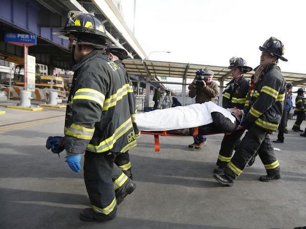 57 injured in NY ferry crash, 2 critical
