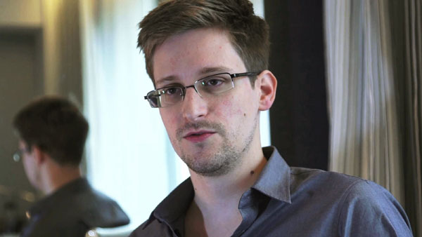 US files criminal charges against Snowden over leaks