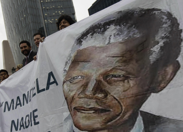 Mandela gaining strength every day: grandson
