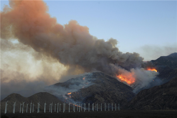 California wildfire destroys 26 homes