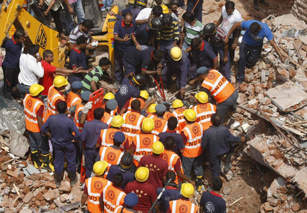 12 killed in twin building collapse in India