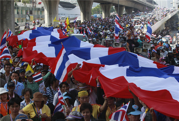 Protesters swarm in Bangkok to demand PM resign