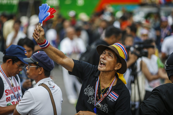 Thai protesters target businesses linked to PM
