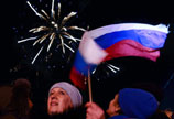 Putin backs agreement on Crimea's accession into Russia