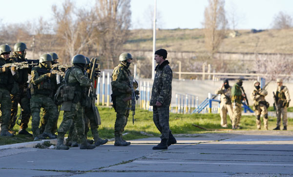 Russian troops seize Crimea airbase