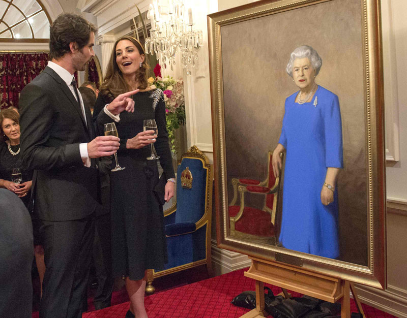 Prince William and his wife Kate unveil portrait of Queen Elizabeth