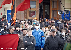 Two killed in police raid in eastern Ukraine