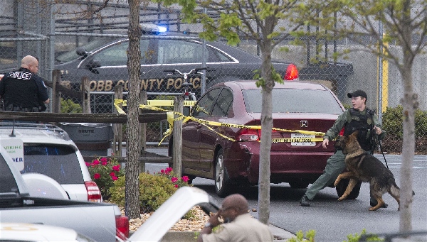 Six hurt, suspect dead in Georgia FedEx facility shooting