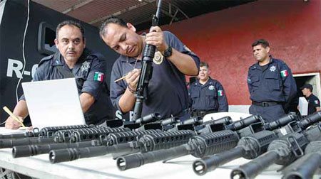 Mexico converts anti-cartel vigilantes into police force
