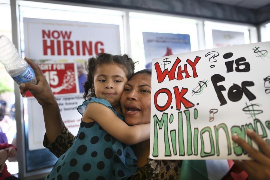 Fast-food workers strike for higher pay