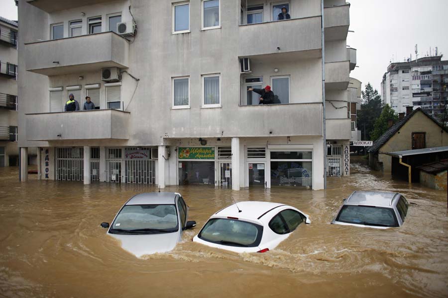 Bodies pulled from submerged homes in Balkans flooding