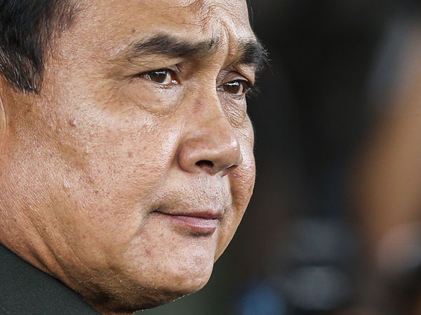 Opposition to Thai coup simmers, ex-PM in 'sa