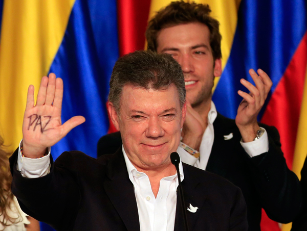 Profile: Colombia's re-elected President Juan Manuel Santos