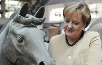 Merkel cautions against letting 'tragic history' repeat itself