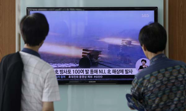 DPRK fires some 100 shells into eastern waters