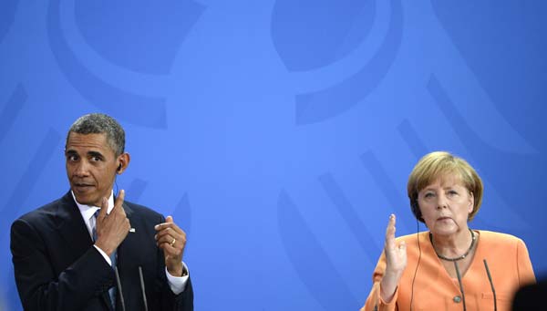 Merkel seeks change in behavior amid spying row