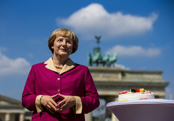Germany's high-flying Merkel to mark low-key 60th birthday