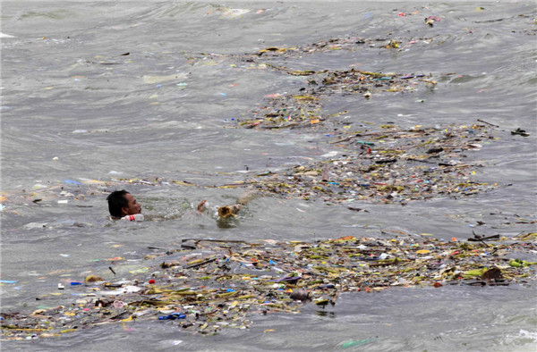 Philippine death toll from typhoon Rammasun rises to 64