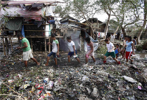 Philippine death toll from typhoon Rammasun rises to 64