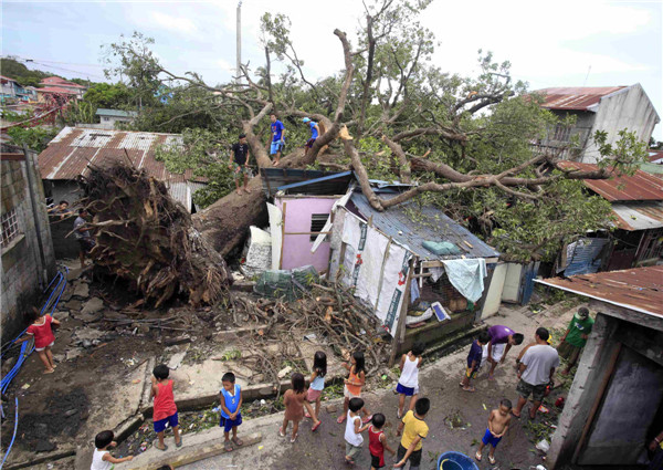 Philippine death toll from typhoon Rammasun rises to 64