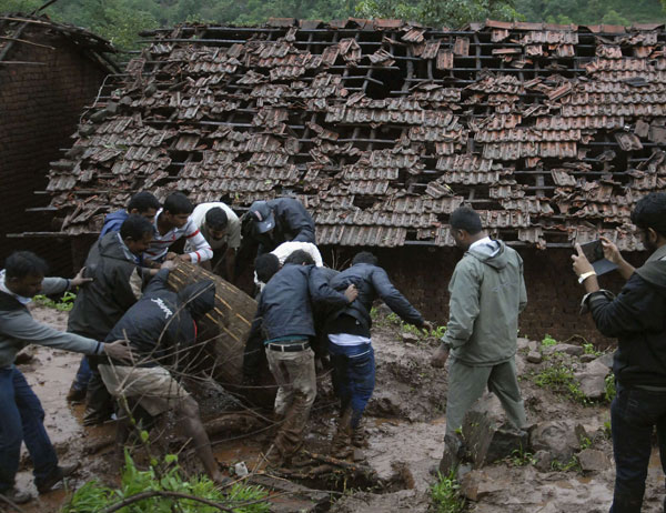 Rain-triggered landslide buries hundreds in India