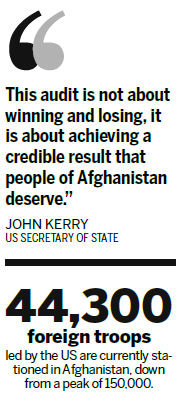 Afghan candidates end clash
