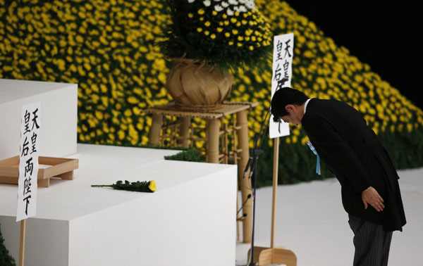 Abe skips renouncing war when marking Japan's surrender