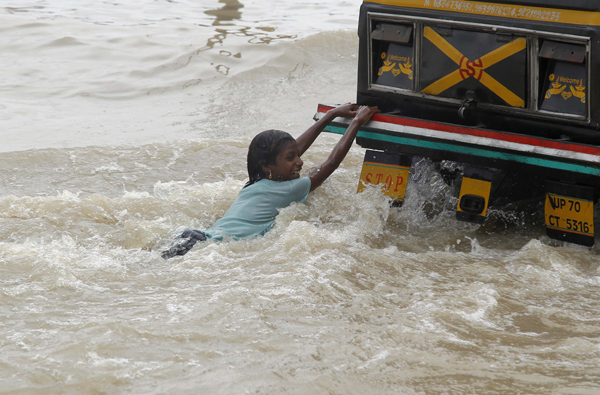 Nepal, India floods leave nearly 200 dead, scores missing