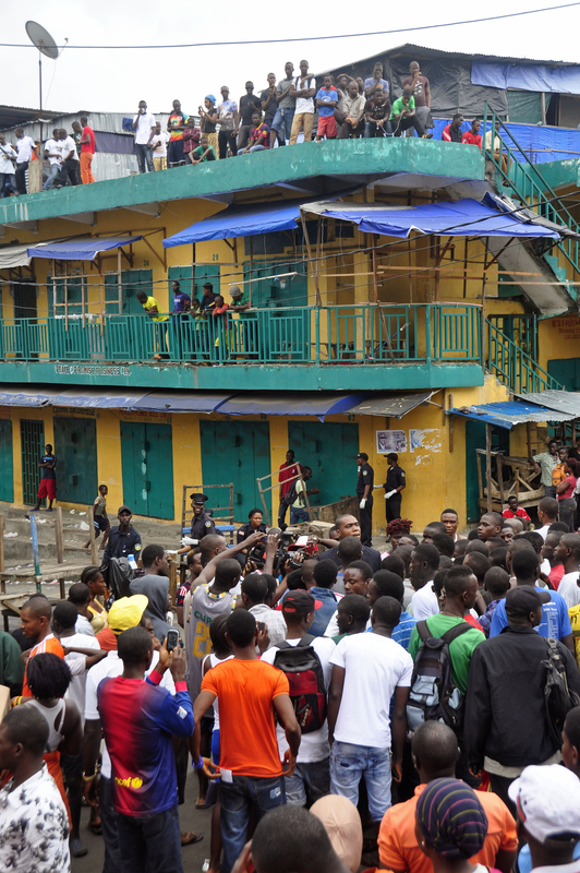 Liberia police fire on protesters in Ebola quarantine