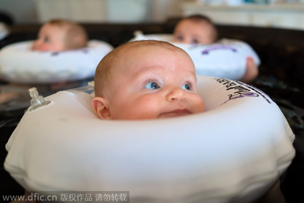 Babies bob about in water at US's first baby spa