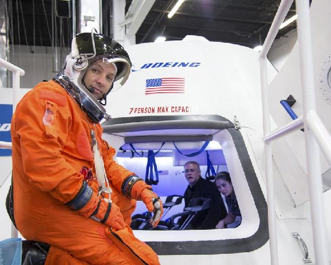 Boeing, SpaceX win contracts to build 'space taxis' for NASA