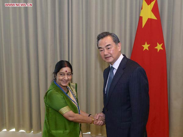 China, India vow to further bilateral ties