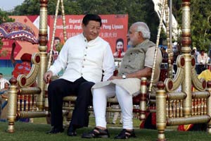 China, India vow to further bilateral ties