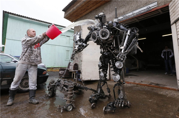 Mechanic creats mobile robots made of used car parts