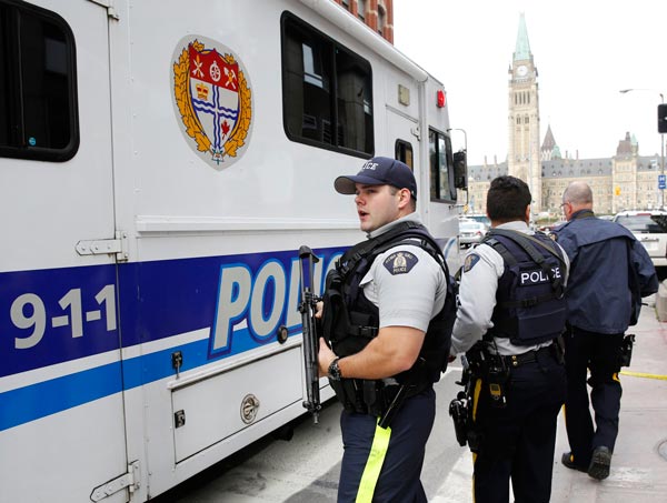 Canada's parliament attacked, soldier fatally shot nearby