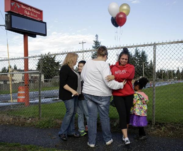 Police seek motive in fatal Washington state school shooting