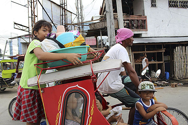 Differing forecasts widen scope of Typhoon Hagupit