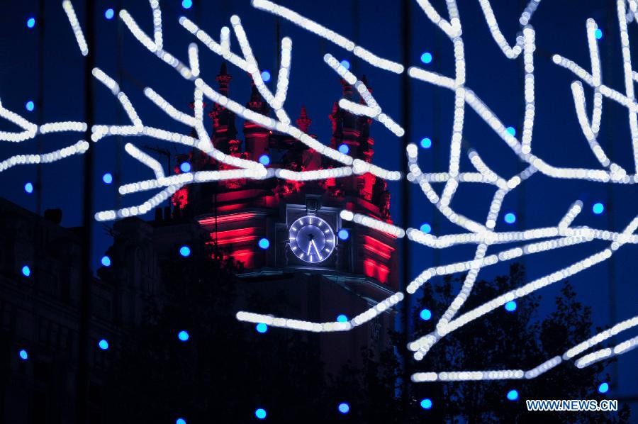 Street illuminated by Christmas lights in Madrid