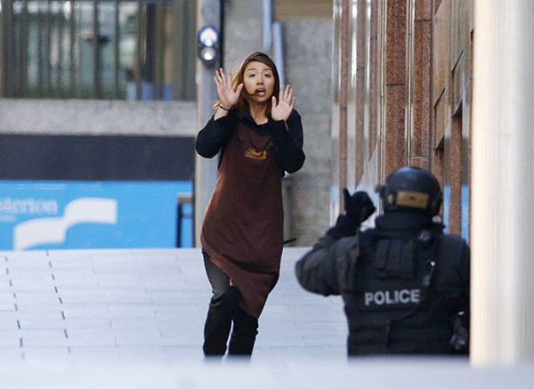 Live: Hostages held in Sydney cafe