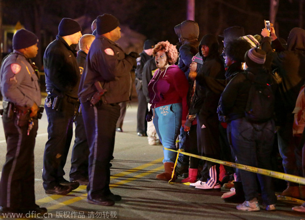 Officer kills armed 18-year-old in suburb near Ferguson