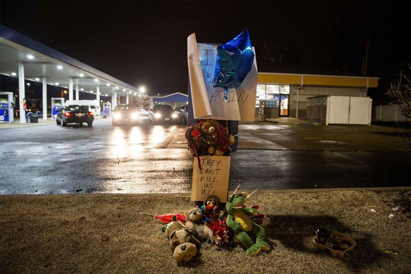 Officer kills armed 18-year-old in suburb near Ferguson