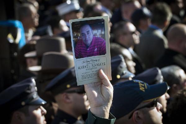 Angry police shun NYC mayor at funeral for slain officer