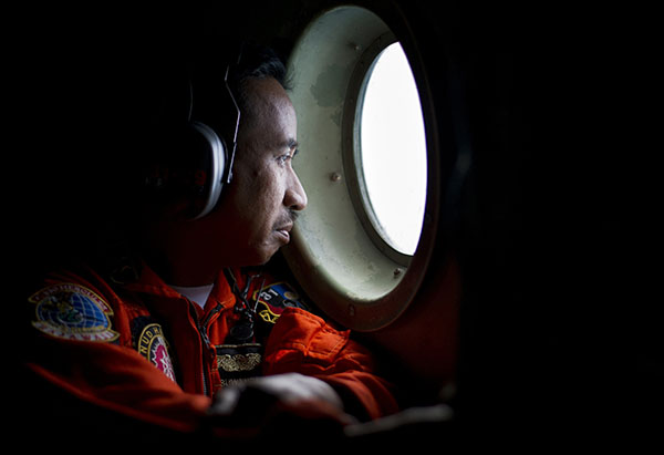 Smoke allegedly spotted on island as search for missing AirAsia plane expands