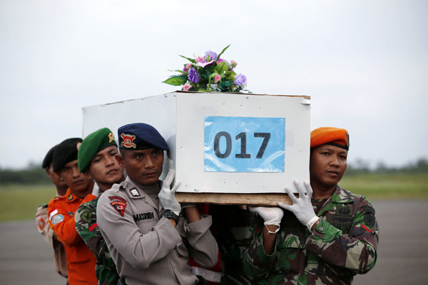 Indonesia official: Some AirAsia victims belted in seats