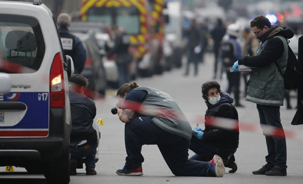 Police hunt three Frenchmen after Paris shooting