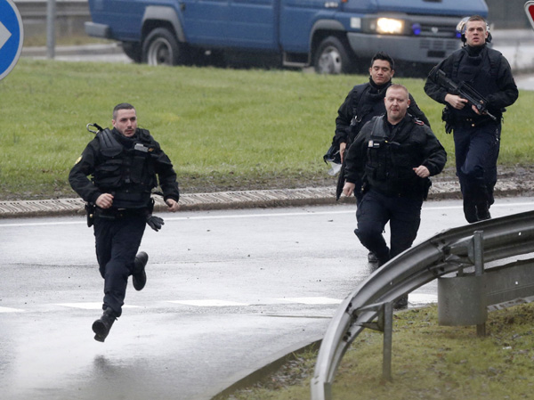 Hostage-taking in French town, Hebdo suspects sighted