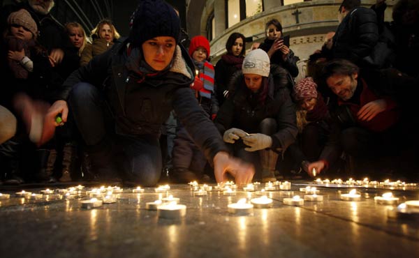 Armed French gendarmes swoop on villages in manhunt for newspaper attackers