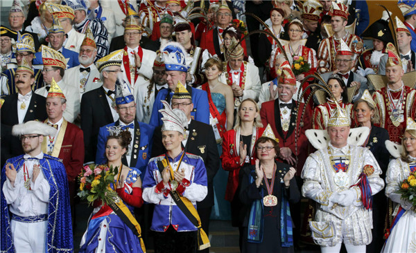 Merkel receives German carnival delegations